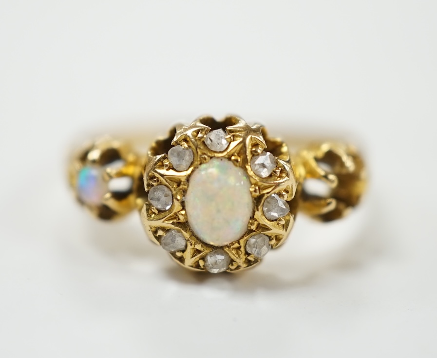 A late Victorian 18ct gold, white opal and diamond cluster set ring, size J, gross weight 2.3 grams. Condition - poor